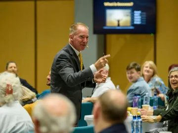 David Lee Jensen coaching a live audience